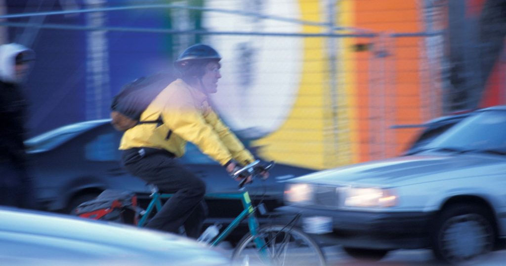 cyclist driving in traffic