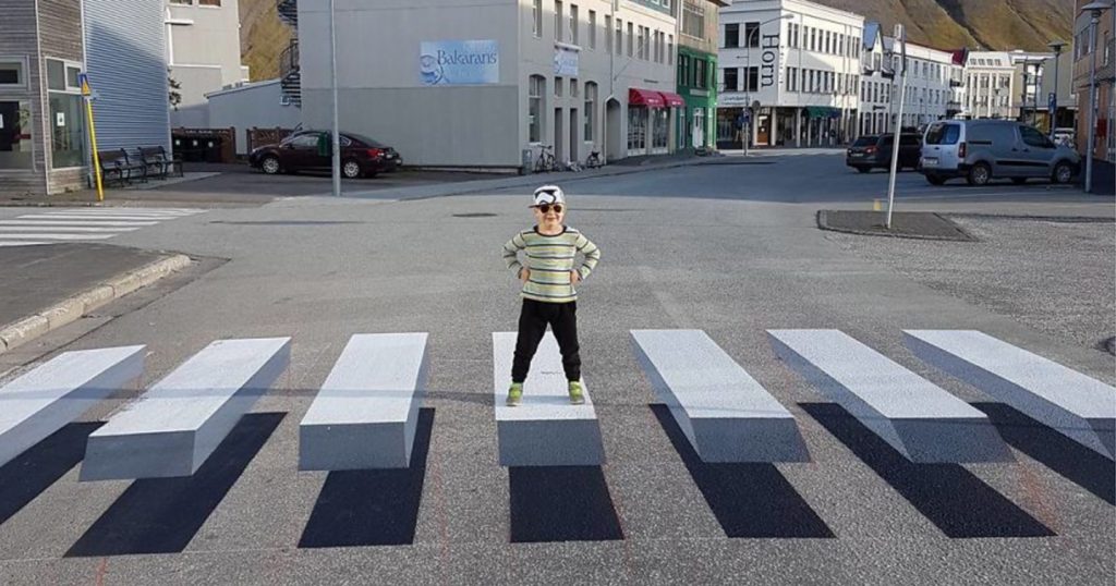 boy standing on 3d crosswalk