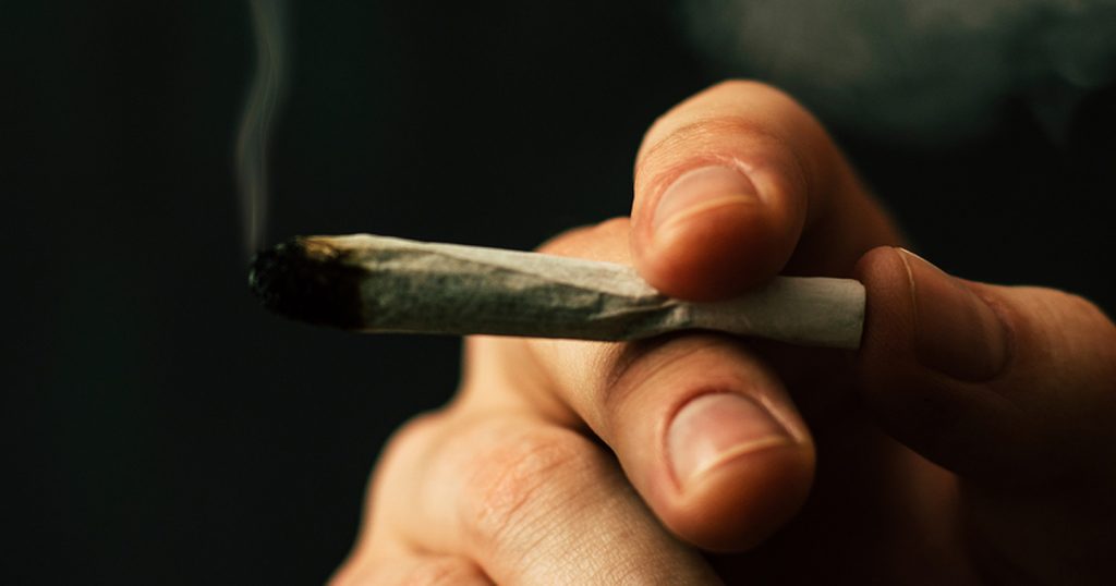 hand of cannabis smoker