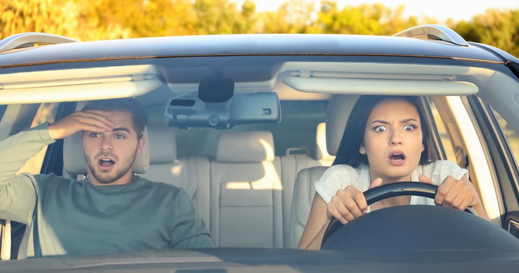 couple reacts to a car accident