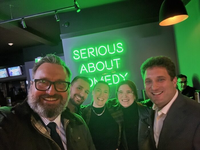 A selfie of Thomson Rogers lawyers attending Good Laughs event
