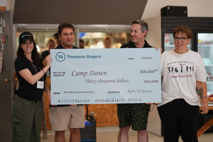 Thomson Rogers lawyers gave $30,000 cheque as a donation to Camp Dawn